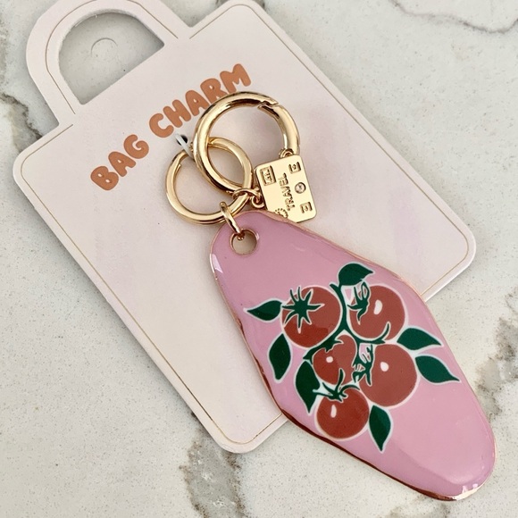 ANTHROPOLOGIE Hotel Key Bag Charm Tomatoes on Pink Background - Picture 2 of 3
